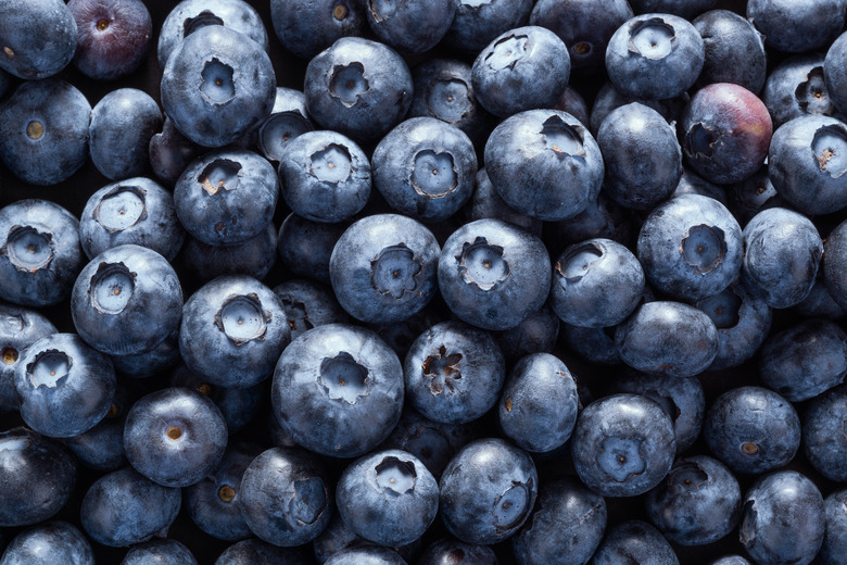 A full-frame shot of harvested blueberries.