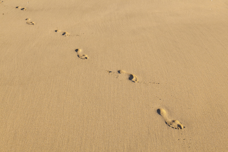 human footsteps at the beach