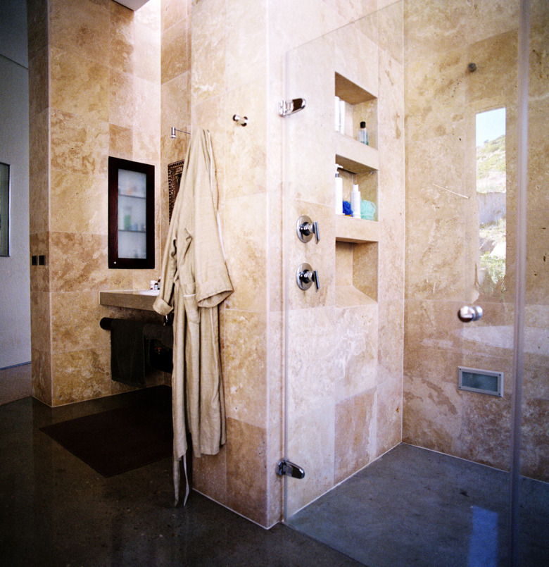 Inside view of a marbled lined bathroom